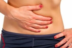abdominal pain due to the presence of parasites in the body